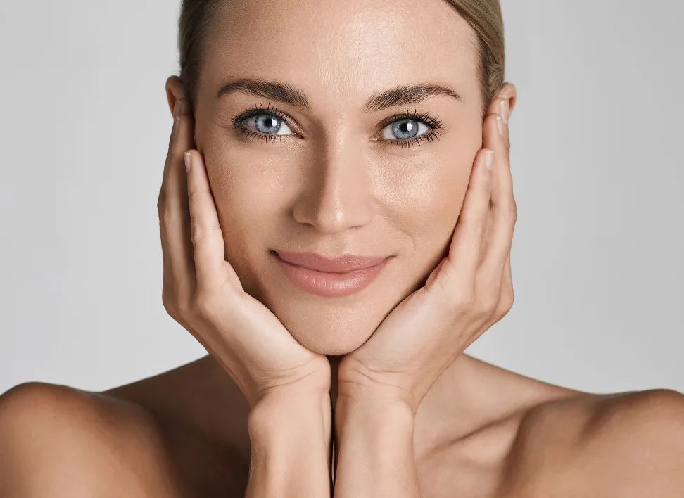 Woman representing improved vitality and balance from hormone optimization.