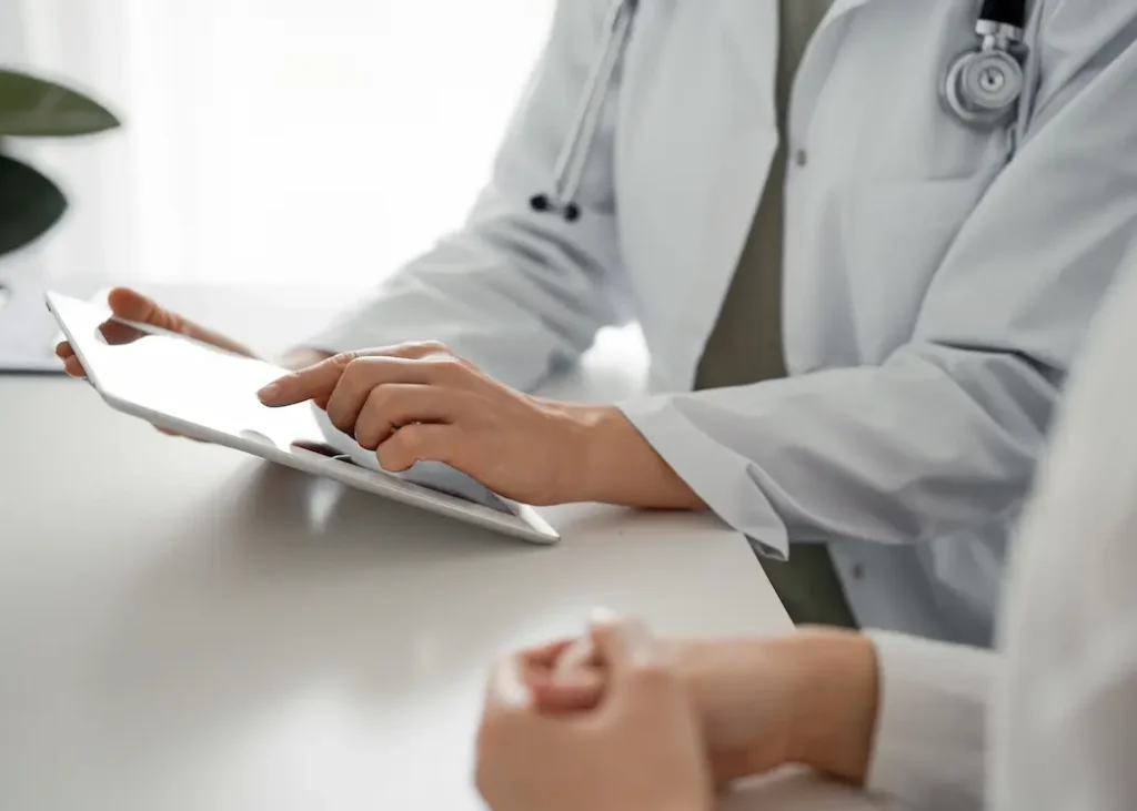 Physician reviewing patient results during personalized longevity consultation