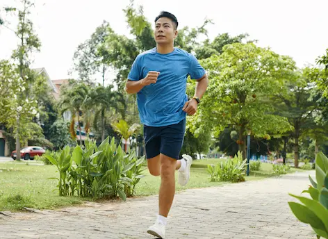Man jogging outdoors to support energy and healthy testosterone levels