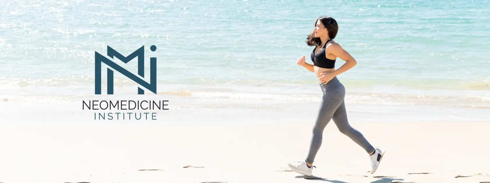 Patient running on beach representing longevity and wellness care at NeoMedicine Institute in Aventura, FL