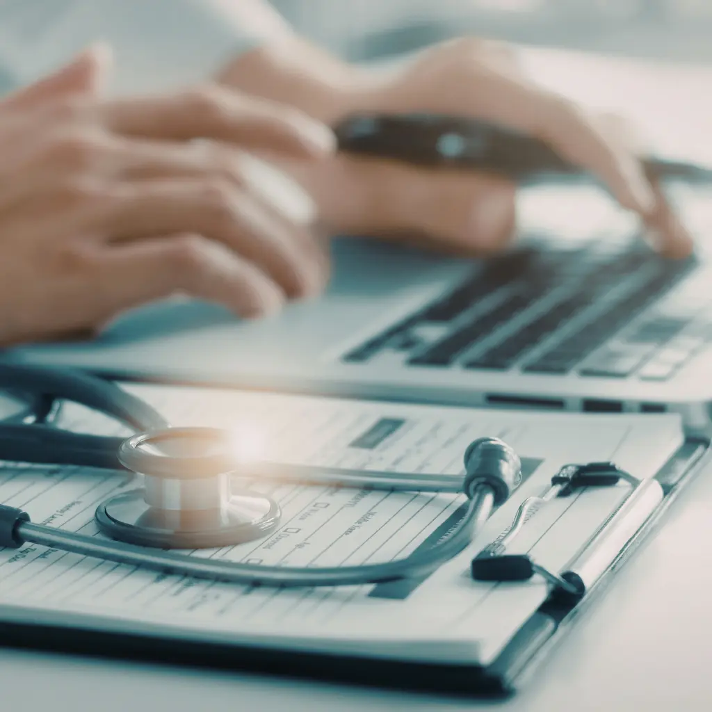 Physician reviewing medical records and biomarker data at a longevity clinic in Miami FL — NeoMedicine Institute